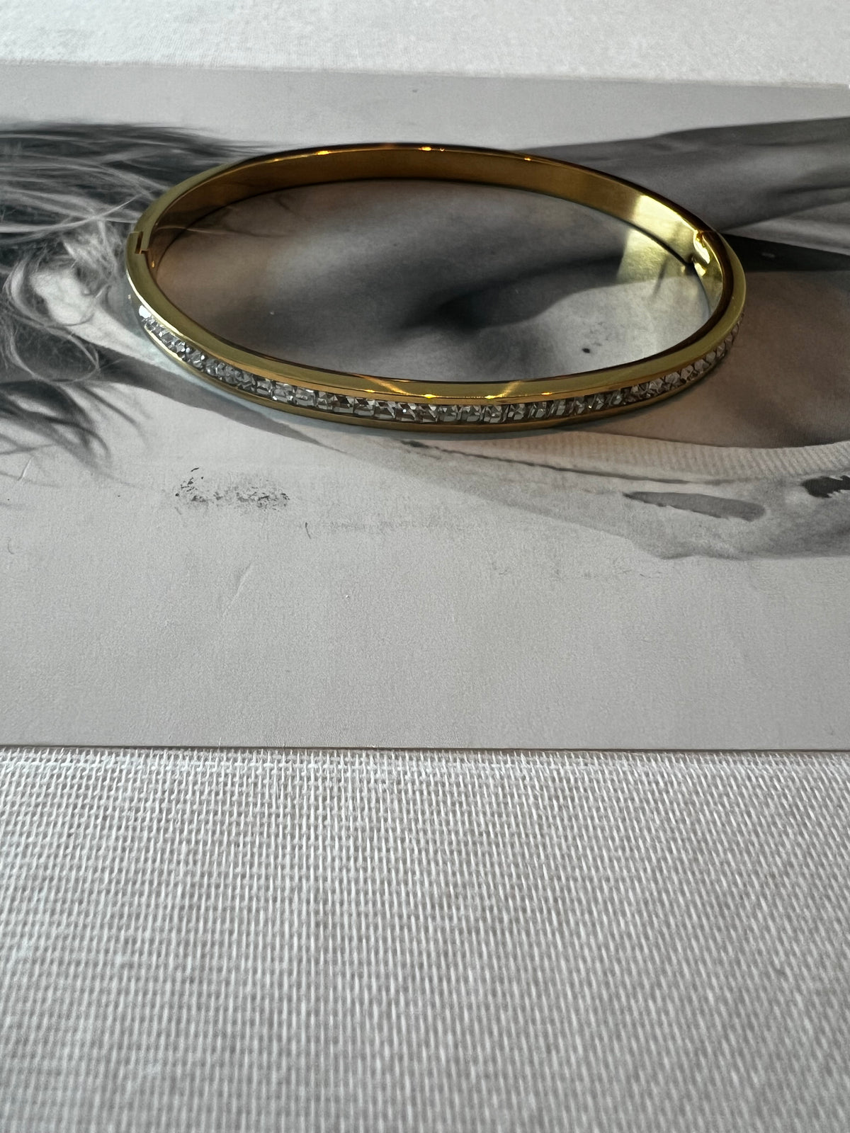 Shimmering channel crystal bangle